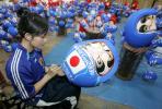 图文-吉祥物伴日本队出征世界杯绘制独具匠心