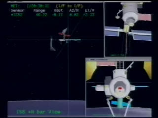 科技时代_图文：NASA控制室显示发现号与国际空间站的位置