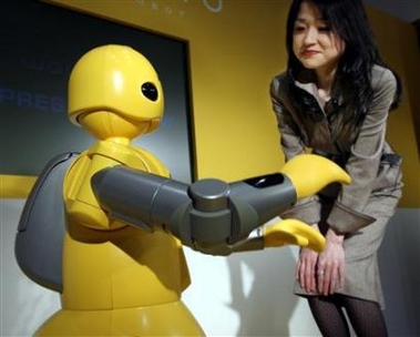 日本智能家用机器人上市 懂四种语言(图)_科学