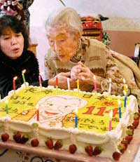 科技时代_日本老妇接棒最长寿老人