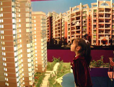 中国拟研究开征物业税深度调控房地产平抑房价