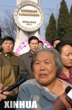 组图：撕开历史的记忆南京大屠杀67周年祭