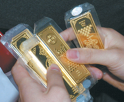 个人投资黄金大门开启 金条金币今开卖(图)