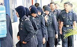 我国要求马来西亚严查中国妇女遭警员侮辱案