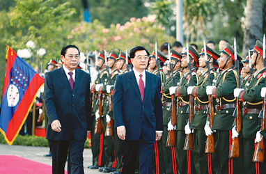 胡锦涛昨抵老挝访问并同朱马利会谈推动两党两
