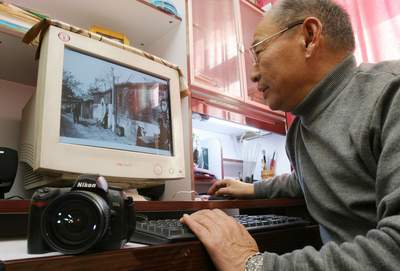 63岁张兰柱15年拍下2000多张老城照片