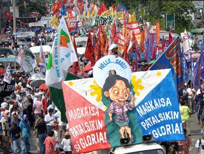 组图:菲律宾总统涉嫌选举舞弊民众示威要求彻查