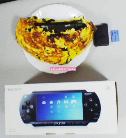 新浪游戏_以PSP为馅的煎蛋以700元人民币售出