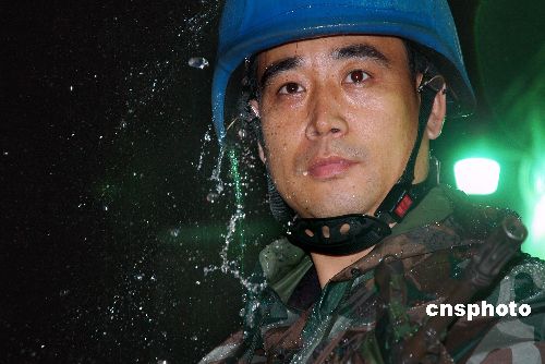 图文：海地夏季雨水也来越多