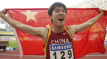 图文-刘翔夺男子110米栏比赛金牌并破亚运纪录