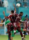 图文-亚运男足伊拉克0-1卡塔尔双方球员争顶