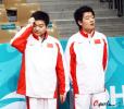图文-男子斯诺克双人赛中国夺冠两冠军的怪异表情