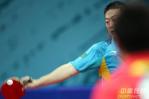 图文-亚运会乒球男单决赛马琳伸直手臂回球