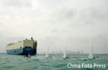 图文-亚运会帆船12月11日赛况海面风浪不小