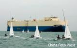 图文-亚运会帆船12月11日赛况选手间差距微小