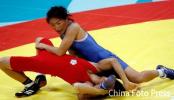 图文-摔跤女子55公斤级决赛台北选手动弹不得