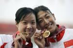 图文-14日亚运39金女子皮艇双人500米中国摘金