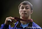 图文-14日亚运39金55公斤级摔跤曼苏罗夫摘金