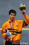 图文-壁球男单马来西亚选手揽金银牌冠军手捧鲜花