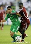 图文-亚运男足决赛伊拉克VS卡塔尔双方激烈拼争