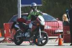 资料图片-F1西班牙大奖赛摩托车手调整护目镜