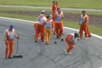 资料图片-F1西班牙大奖赛工作人员检修赛道