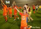 图文-鲁能1-0国安提前夺冠李金羽赛后跪地振臂欢呼