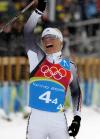 图文-越野滑雪女子4×5公里接力金策尔正振臂庆贺