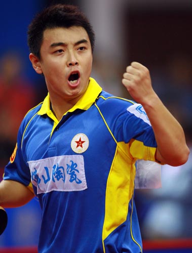 图为-十运会乒乓球男子团体赛况王浩振臂高呼