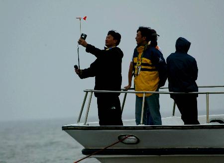 图文-帆船帆板大雾拖延比赛专业科学保驾十运会