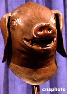 猪首铜像的文物年代图片