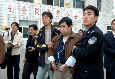 邯鄲農行被盜案疑犯任曉峰被移交河北警方(圖)