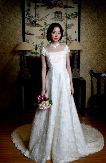 《大长今》中医女阿烈扮演者李世恩的婚纱写真曾经在韩国和中国台湾