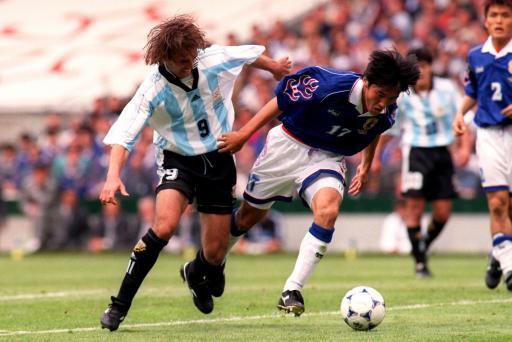 1998年6月14日,日本足球队首次晋级世界杯决赛圈